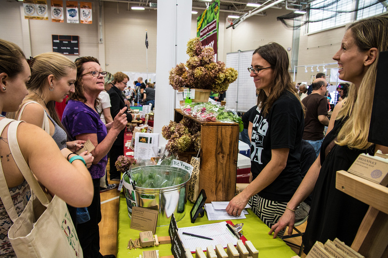 Exhibitors and attendees at Veg Food Fest