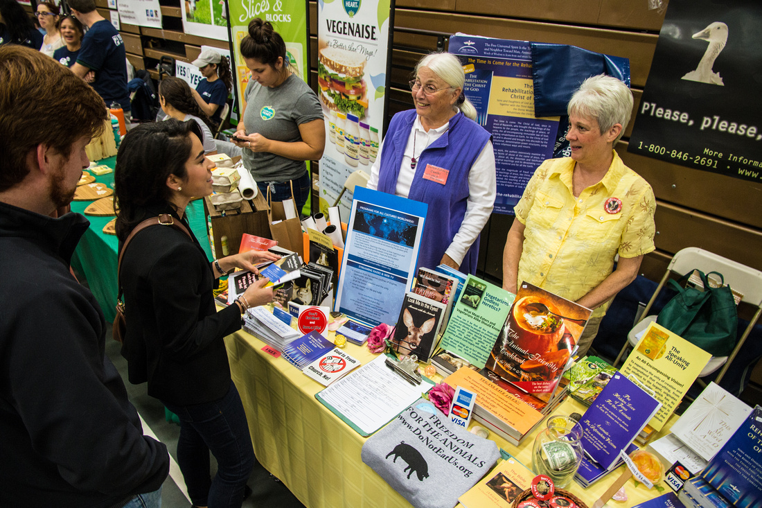 Exhibitors and attendees at Veg Food Fest