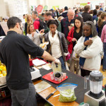 trying veggies juice at Boston Veg Food Fest 2013