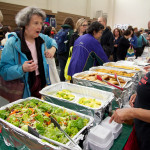 fresh greens and vegan food at table at Boston Veg Food Fest 2013